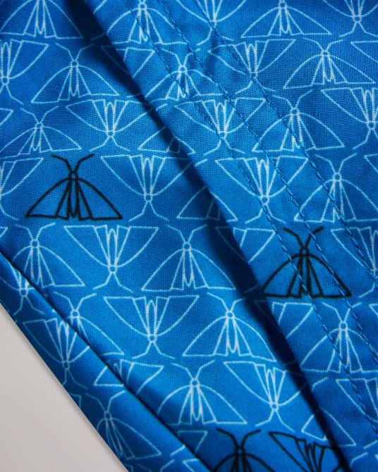 Ted Baker hombres 2ZFP1432 ropa shorts de baño con estampado de mariposas Renshaw azul