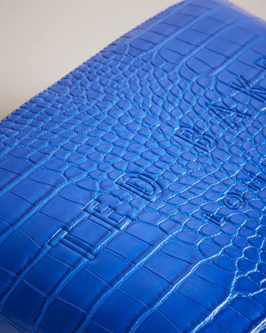 Ted Baker mujer 2ZFP823 bolsas neceser crocana con detalle de cocodrilo grabado azul brillante